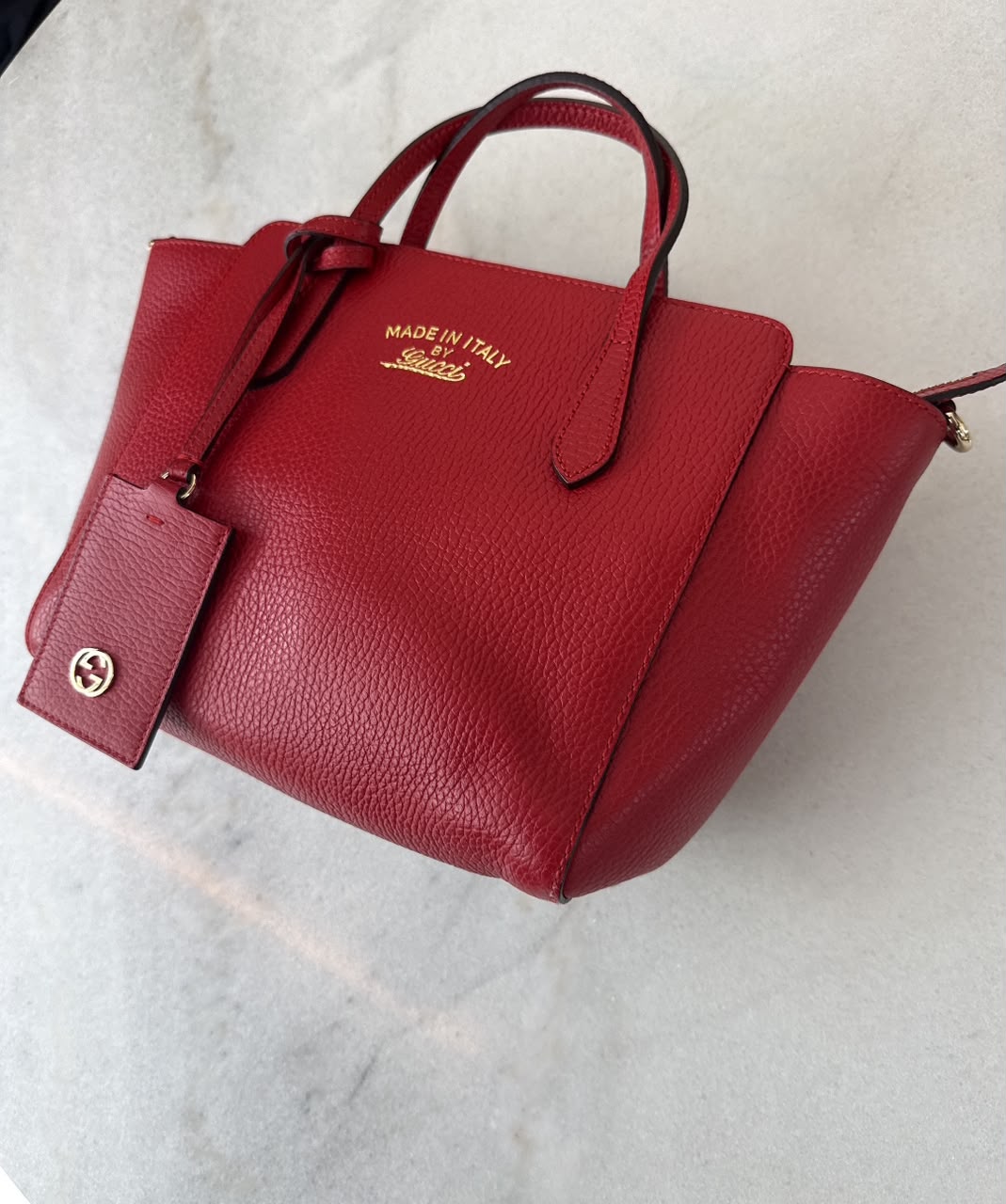RED LEATHER MINI SWING TOTE BAG