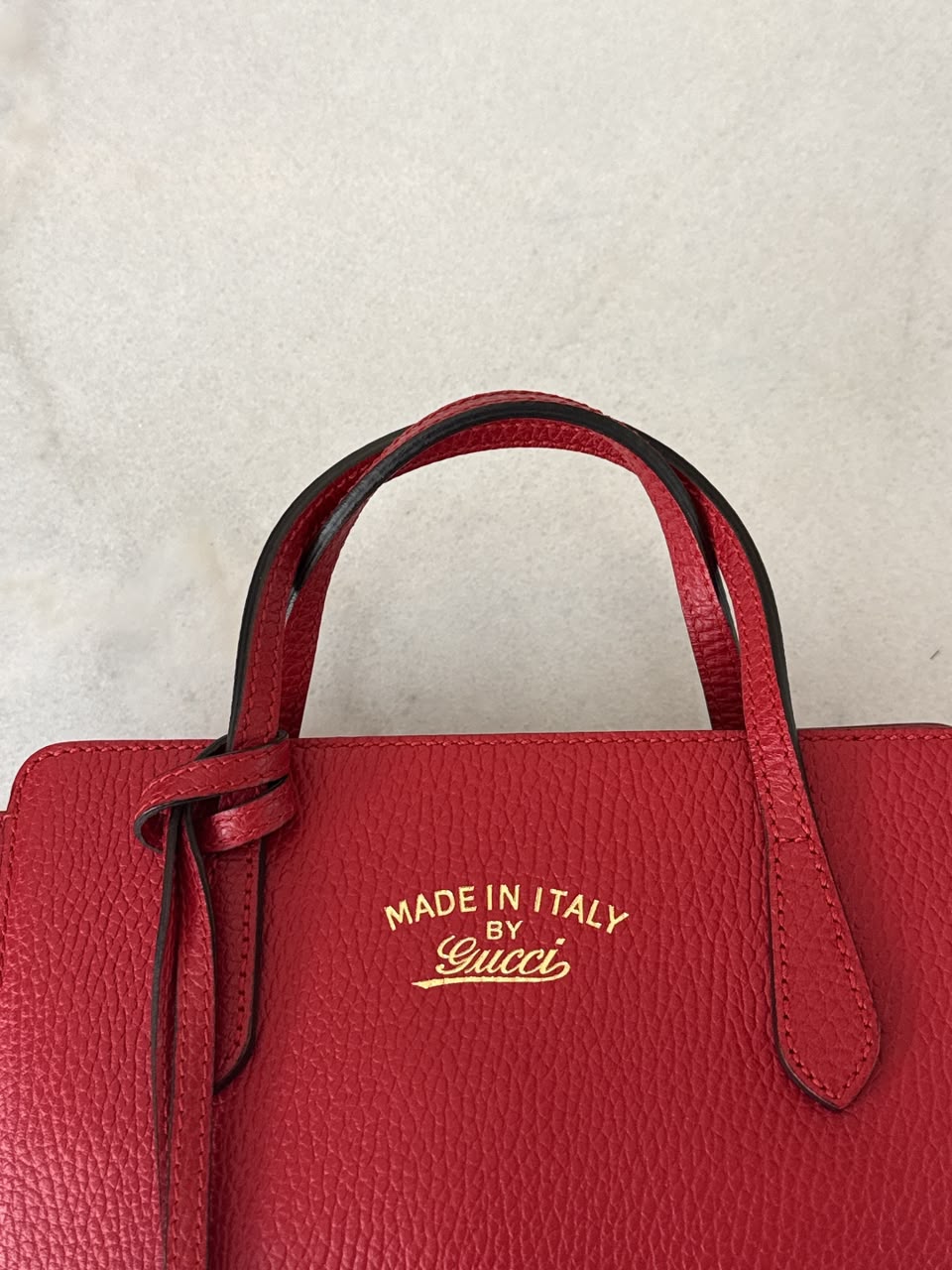RED LEATHER MINI SWING TOTE BAG