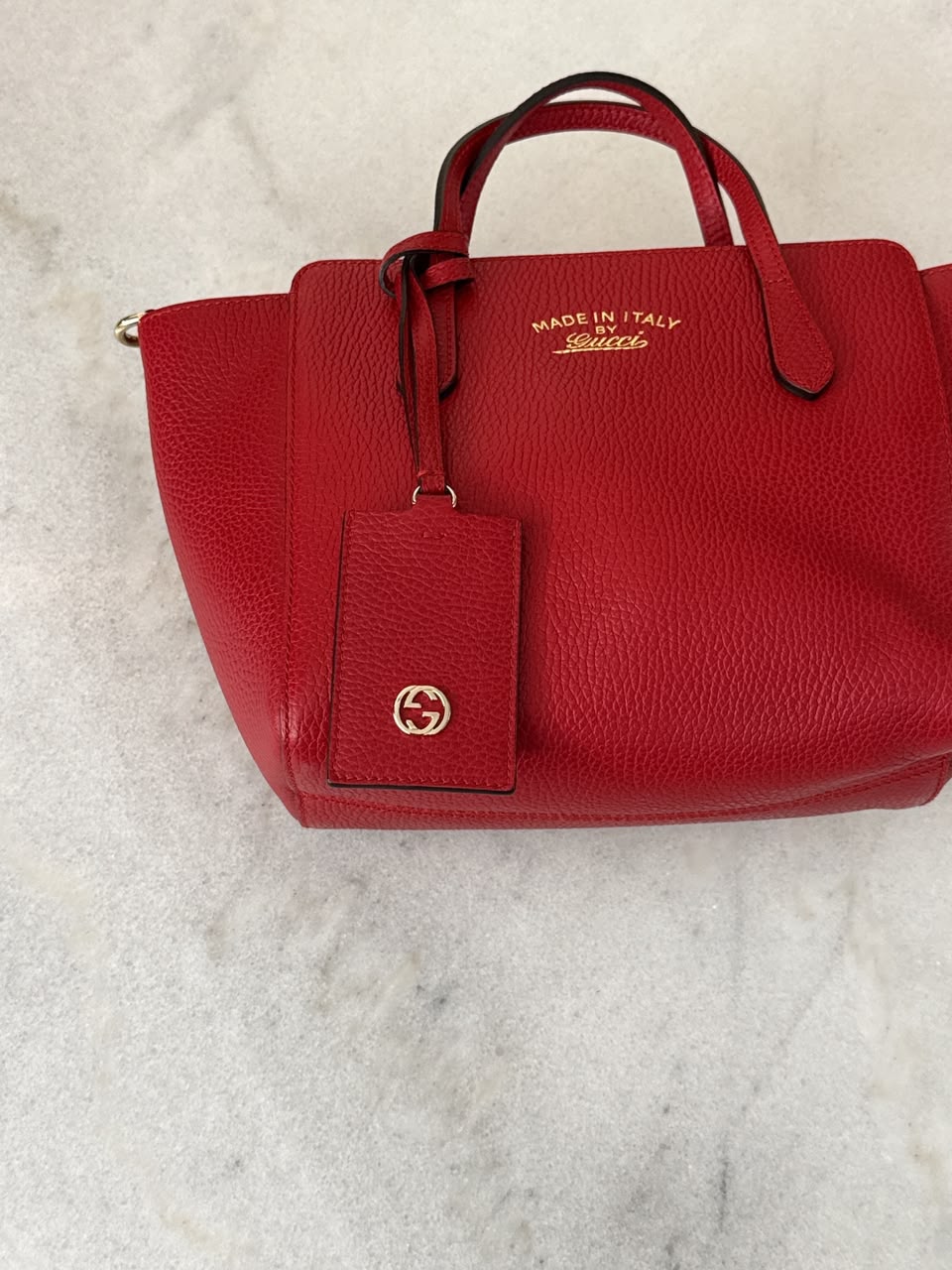 RED LEATHER MINI SWING TOTE BAG