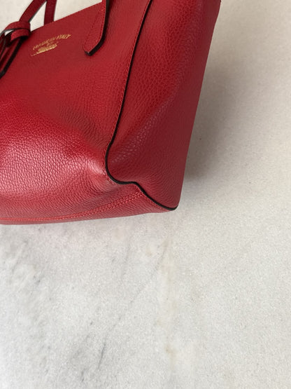 RED LEATHER MINI SWING TOTE BAG