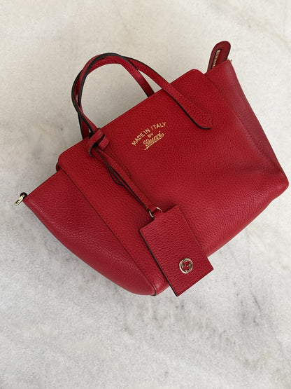 RED LEATHER MINI SWING TOTE BAG