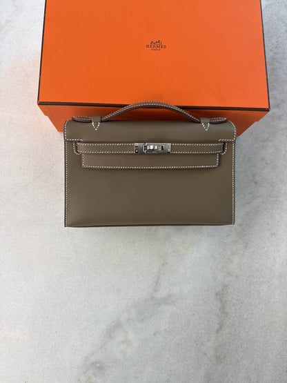 ETOUPE KELLY POCHETTE SWIFT LEATHER PALLADIUM HARDWARE