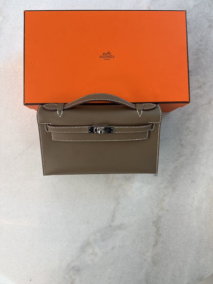 ETOUPE KELLY POCHETTE SWIFT LEATHER PALLADIUM HARDWARE