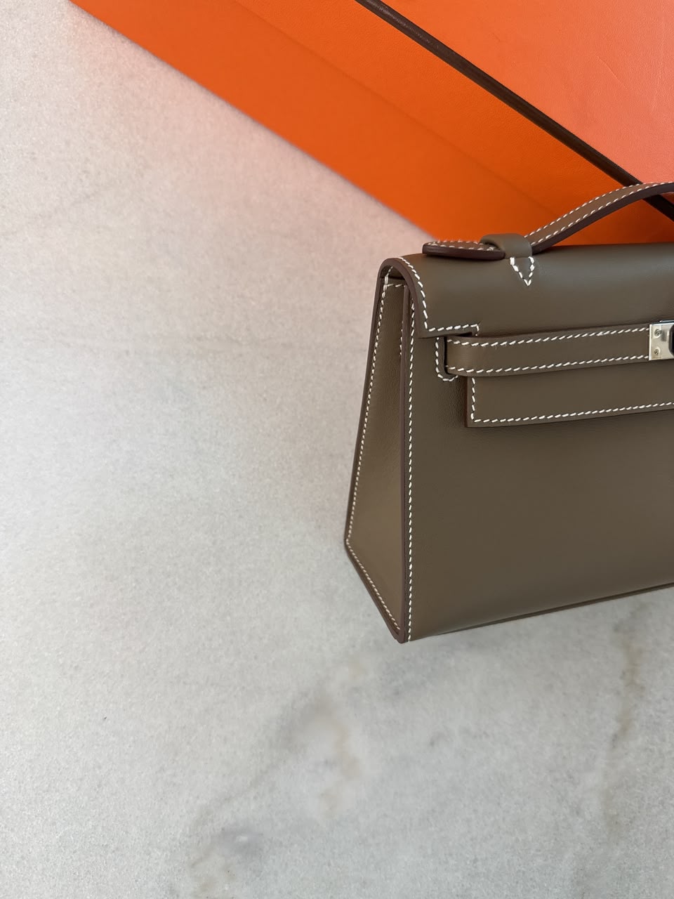 ETOUPE KELLY POCHETTE SWIFT LEATHER PALLADIUM HARDWARE