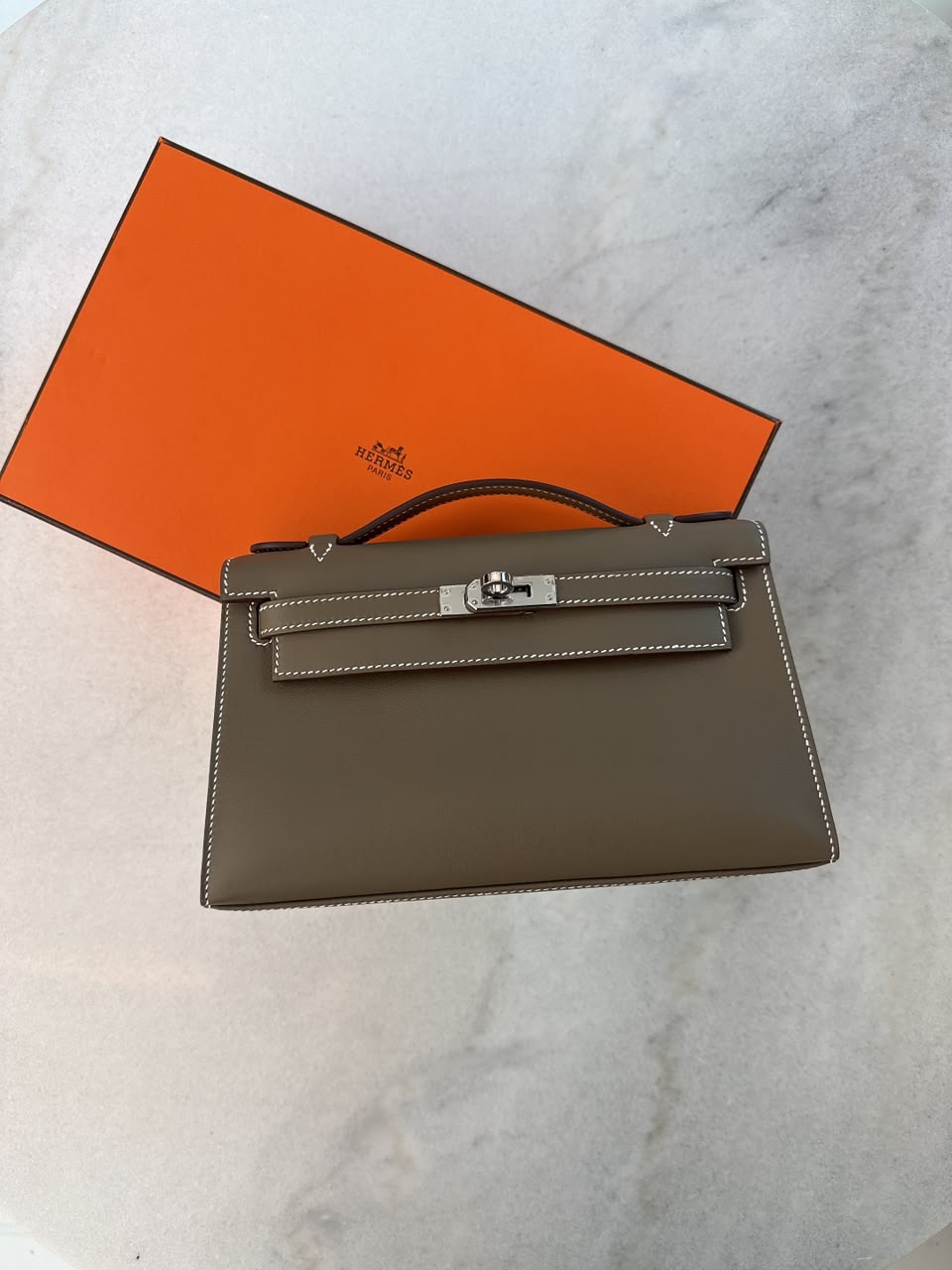ETOUPE KELLY POCHETTE SWIFT LEATHER PALLADIUM HARDWARE