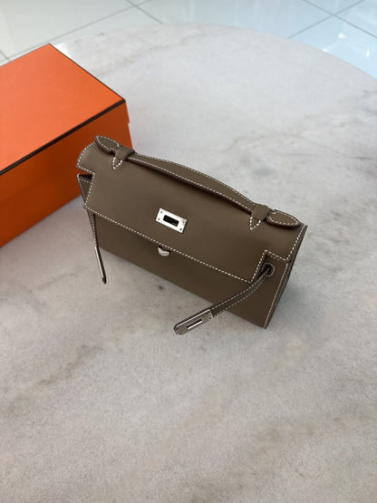 ETOUPE KELLY POCHETTE SWIFT LEATHER PALLADIUM HARDWARE