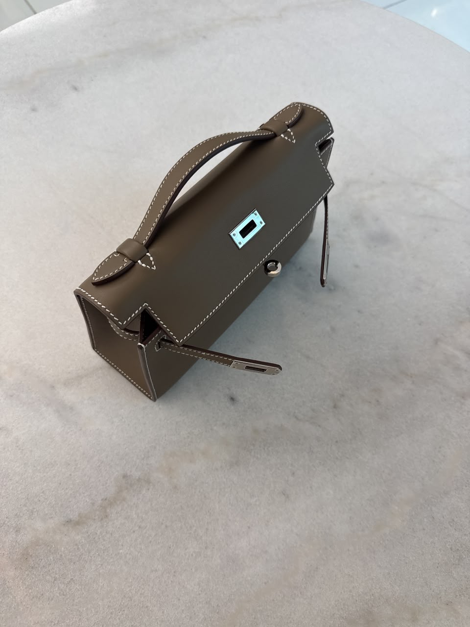 ETOUPE KELLY POCHETTE SWIFT LEATHER PALLADIUM HARDWARE