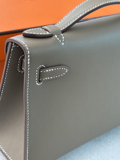 ETOUPE KELLY POCHETTE SWIFT LEATHER PALLADIUM HARDWARE