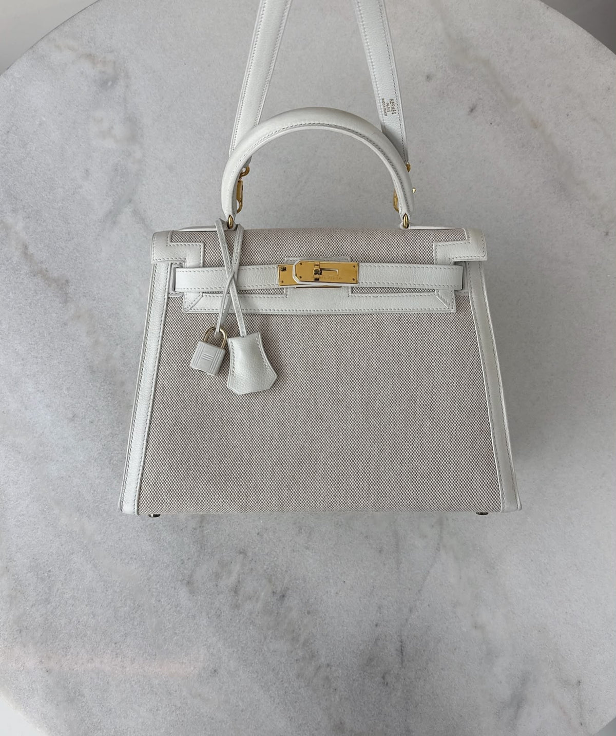 BEIGE CANVAS AND WHITE LEATHER KELLY SELLIER 28 GOLD HARDWARE