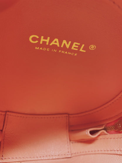 CC QUILTED LAMBSKIN ROUND CROSSBODY BAG